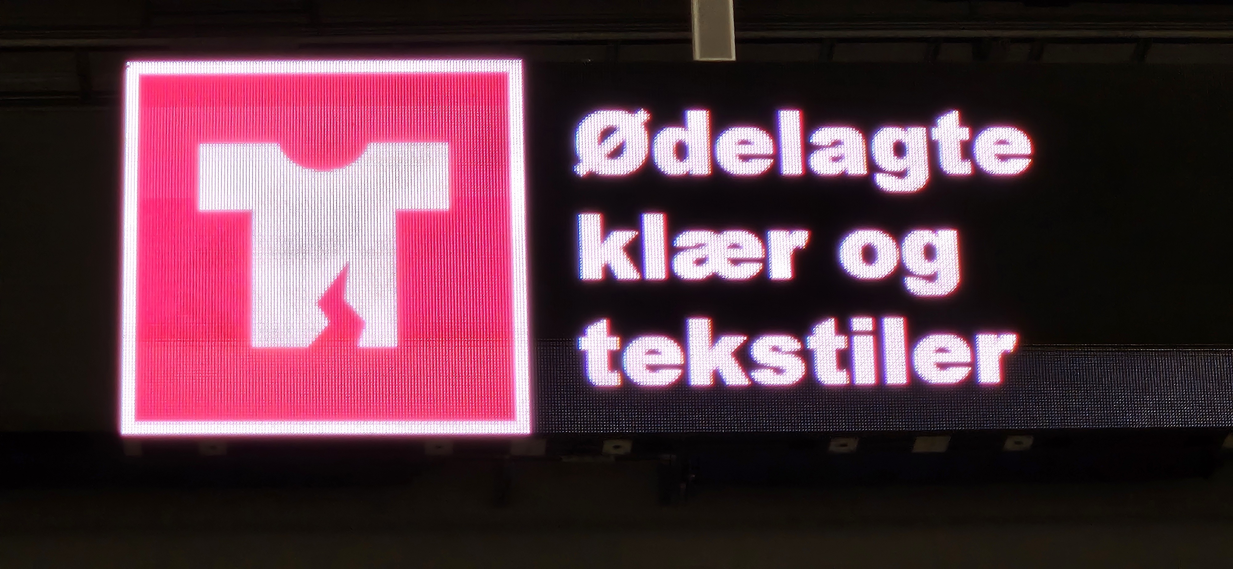 Bilde av skilt med symbol for ødelagte klær og tekstiler