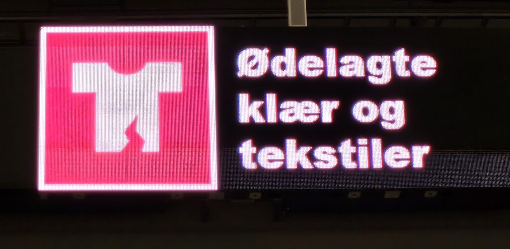 Bilde av skilt med symbol for ødelagte klær og tekstiler